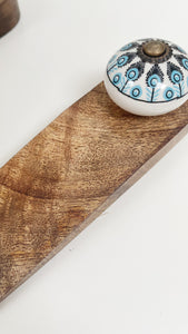 Pavo Doorstop